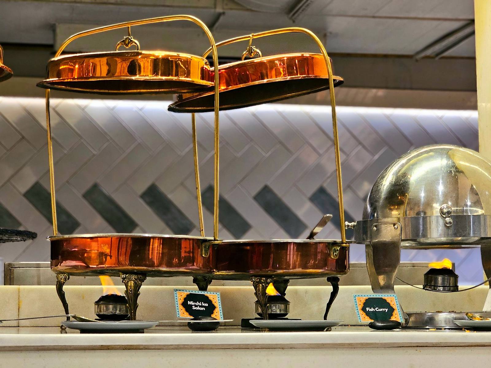 Chafing dishes set up on a buffet line